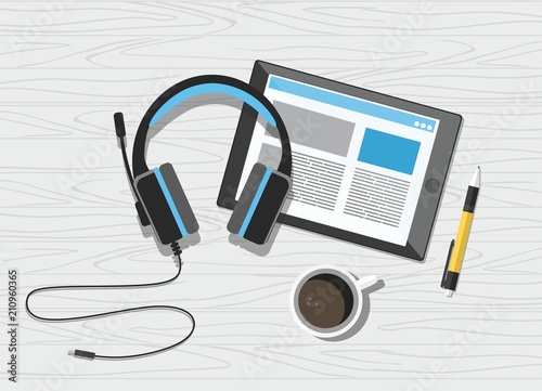 Acoustic headphones with tablet and coffee on white wooden background 