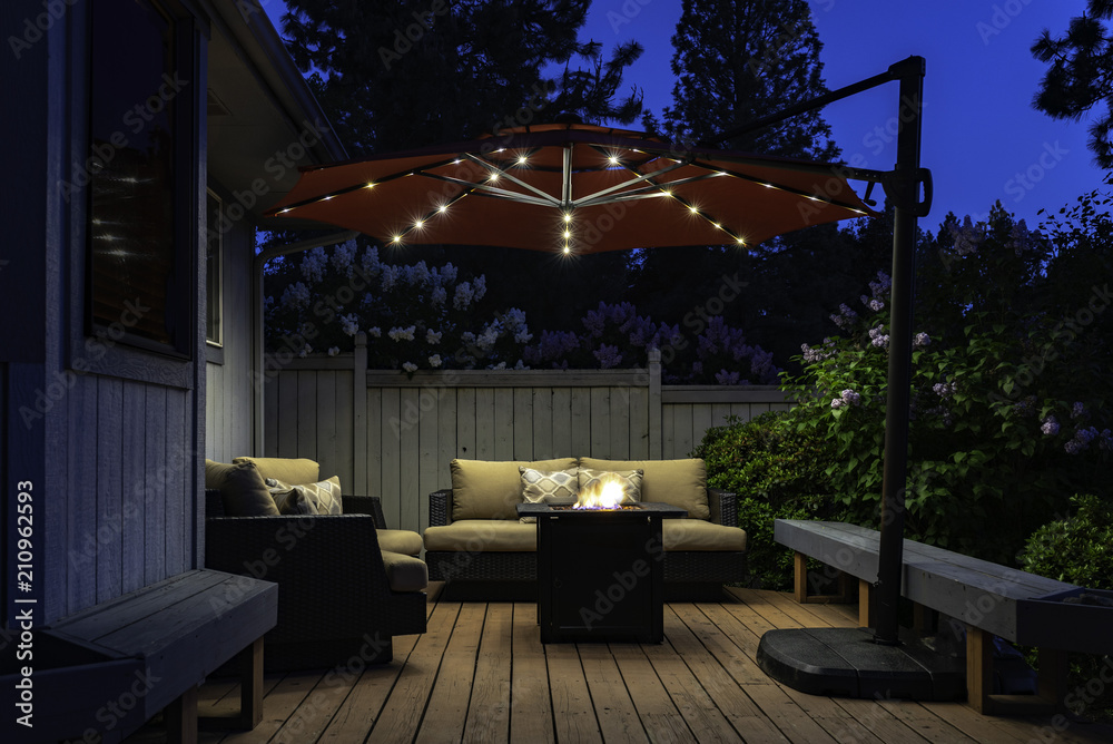 Backyard Deck Umbrella Summer Scene at Twilight - obrazy, fototapety, plakaty 