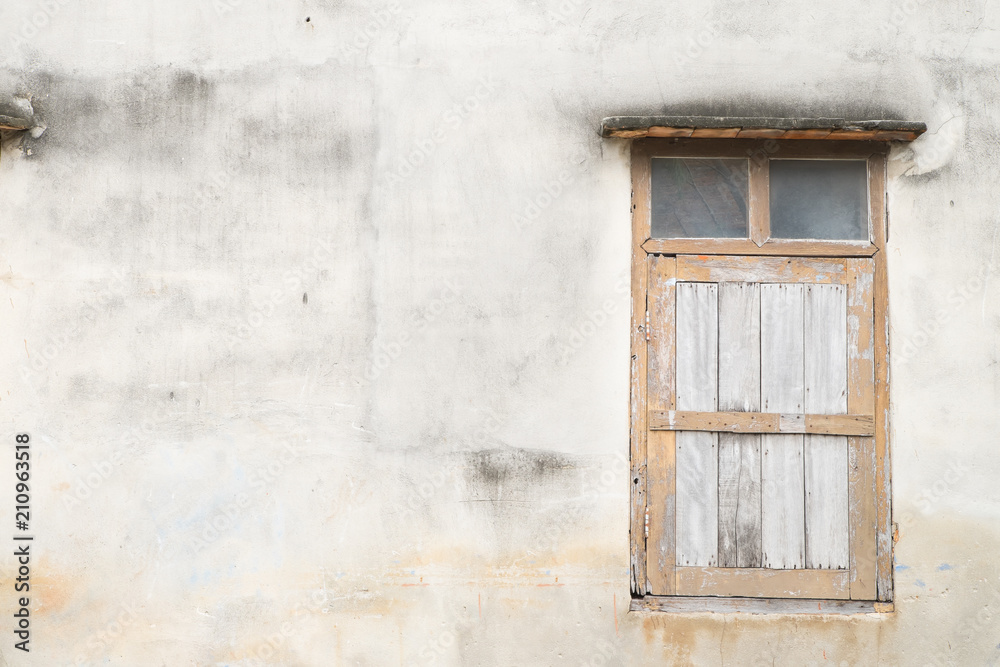 Fototapeta premium Closed old brown windows of historic house 