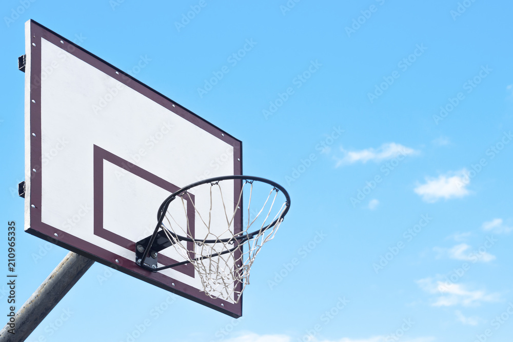 Basketball net on sky background