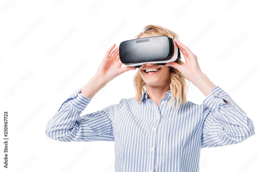 smiling attractive woman using virtual reality headset isolated on white