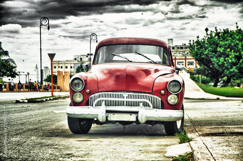 old american car parked on street of habana © javier
