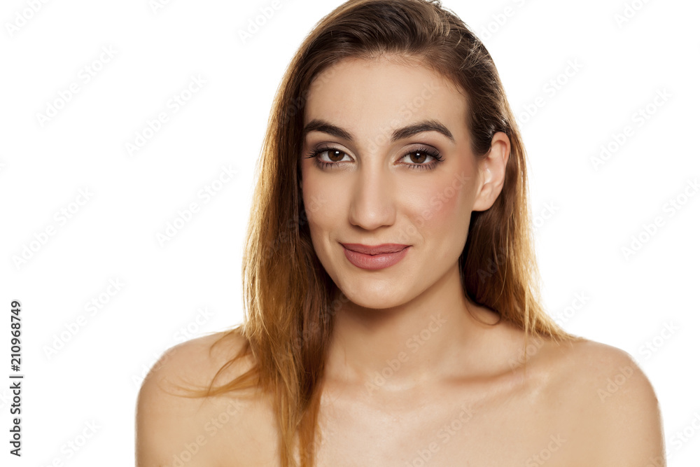 Young beautiful woman with makeup om white background Young beautiful woman with makeup om white background