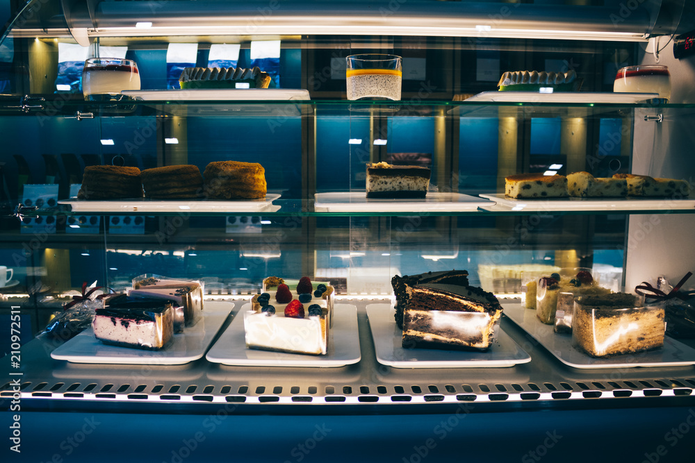 Showcase with a variety of cakes and pastries