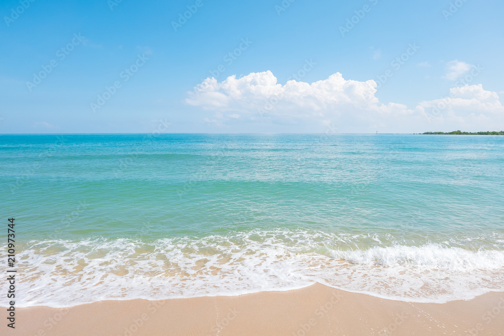 HDR shot of sea shore with wave and white sand during summer day in thailand (selective focus and white balance / color tone shift ) HDR shot of sea shore with wave and white sand during summer day in thailand (selective focus and white balance / color tone shift )