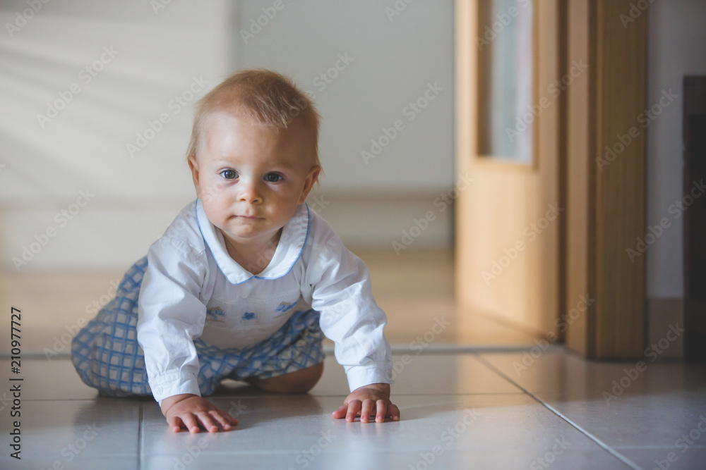 Close portrait of little toddler boy, smiling at camera Close portrait of little toddler boy, smiling at camera