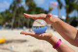 Beach through a glass ball