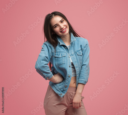 Stylish young woman in denim