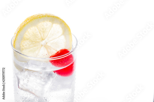 Classic Tom Collins cocktail isolated on white background. Copyspace