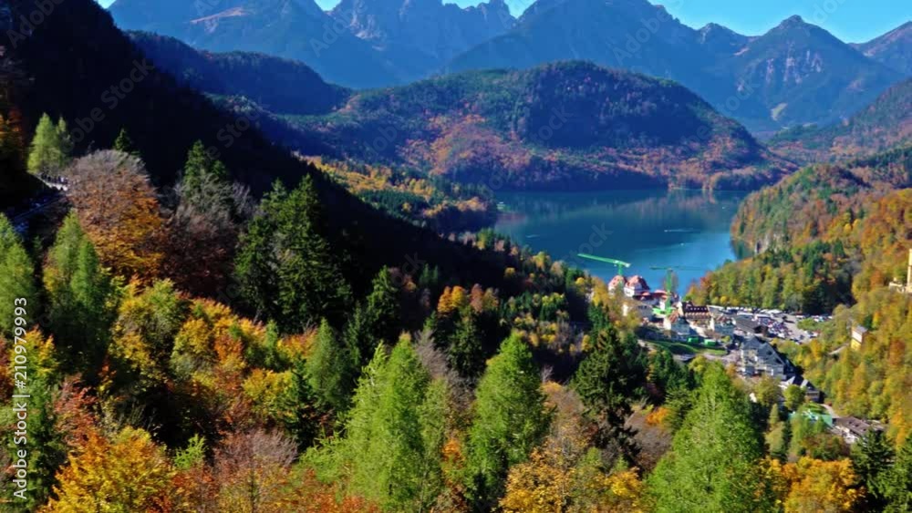 Hohenschwangau lake near Neuschwanstein Castle and Alps mountains at fall, Bavaria, Germany Hohenschwangau lake near Neuschwanstein Castle and Alps mountains at fall, Bavaria, Germany