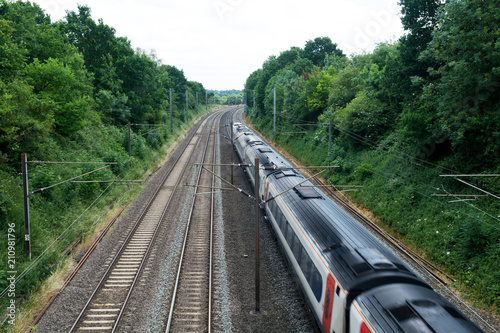 Fast train travelling on the tracks, passenger train