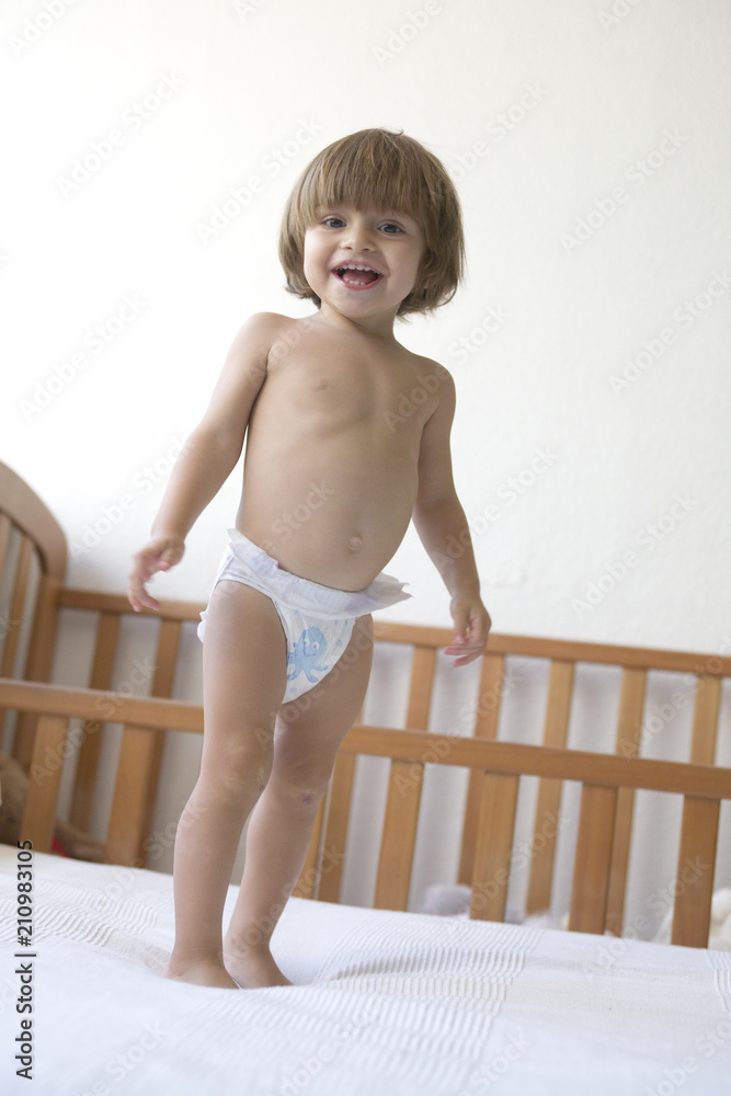 Baby girl, 22 months, Toddler, smiling, Nappy, Diaper, Bedroom