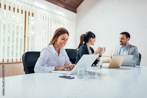 Business people working in conference room.