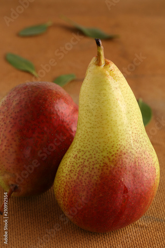 Fresh ripe organic pears on rustic wooden table