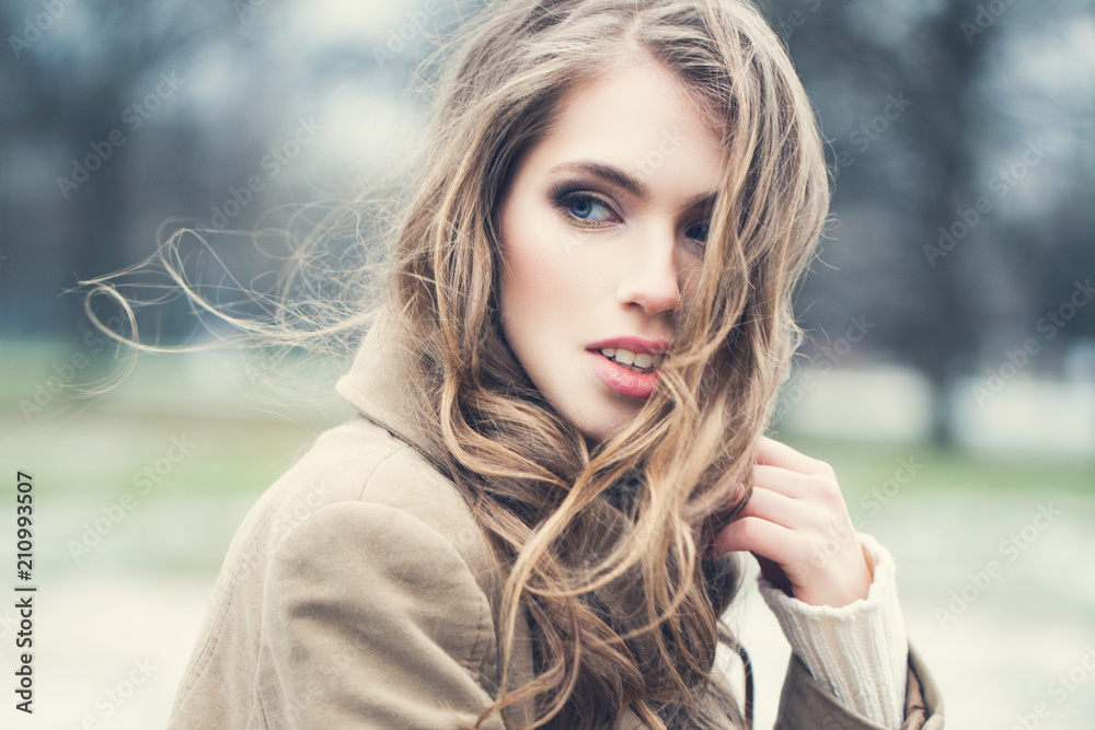 Beautiful model walking in park, outdoors portrait Beautiful model walking in park, outdoors portrait