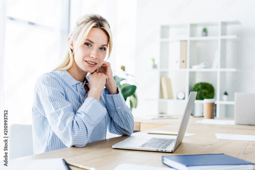 attractive businesswoman working on startup project in office with laptop attractive businesswoman working on startup project in office with laptop
