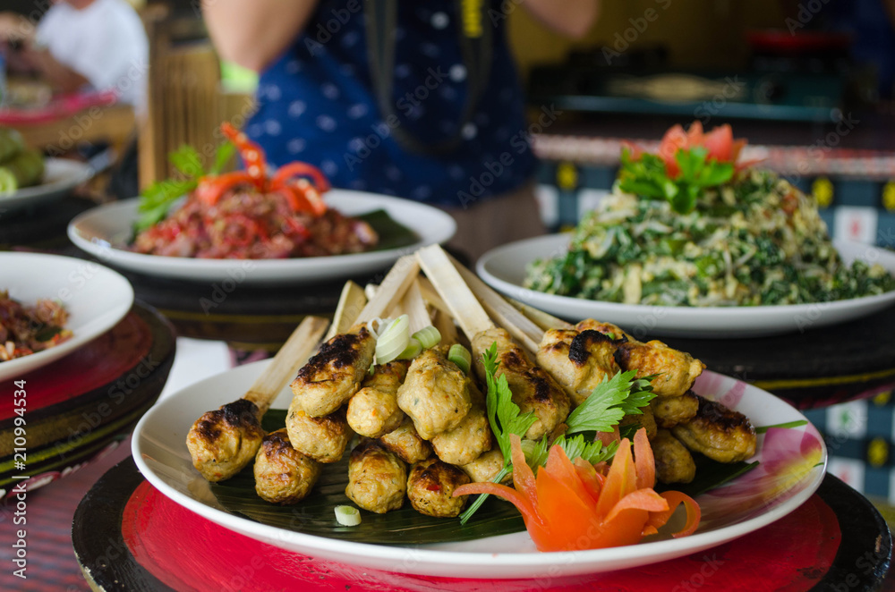 Smoked tuna sticks prepared during the cooking class in Bali, Ubud. Traditional Balinese food. Smoked tuna sticks prepared during the cooking class in Bali, Ubud. Traditional Balinese food.