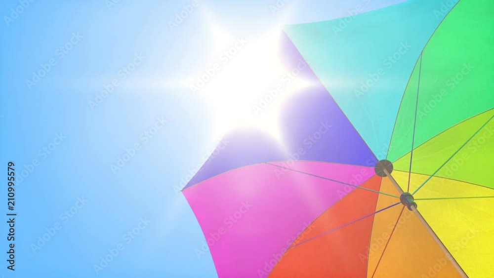 Loop: Sun umbrella rotating under summer sunny sky Loop: Sun umbrella rotating under summer sunny sky