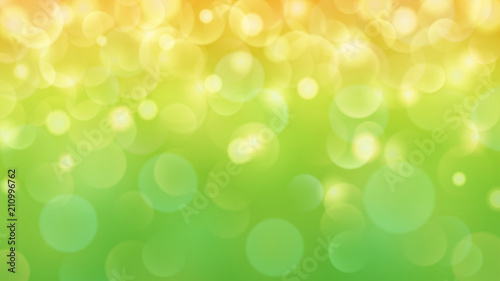 Abstract light background with bokeh effects in green and yellow colors