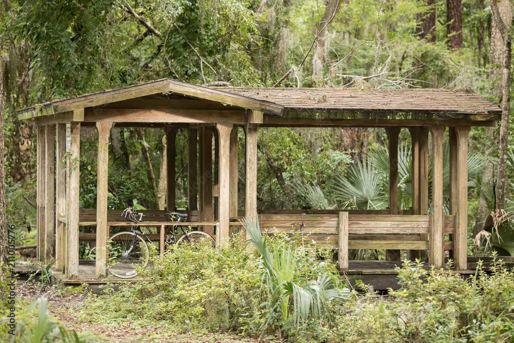 Secluded Florida Park Wooden Structure with Bike Secluded Florida Park Wooden Structure with Bike