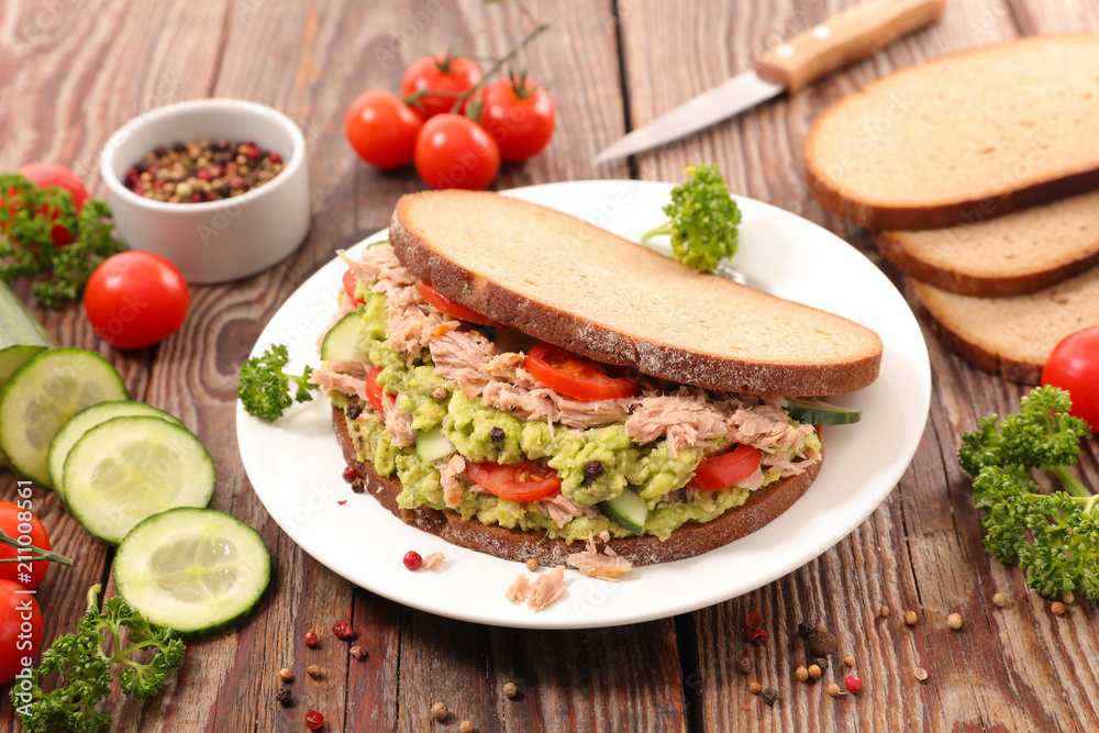 sandwich with tuna, avocado and tomato