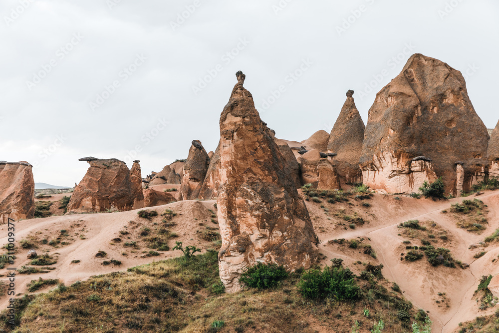 Fototapeta premium scenic landscape with eroded bizarre rock formations in famous cappadocia, turkey