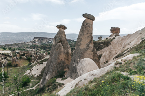majestic landscape with eroded bizarre rock formations in famous cappadocia, turkey
