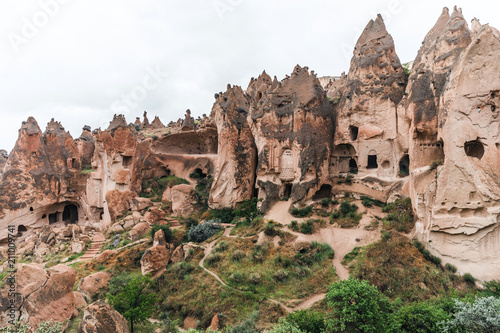 majestic view of scenic caves in limestone at famous cappadocia, turkey