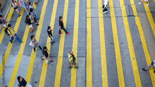 Busy pedestrian and car crossing at Hong Kong - time lapse