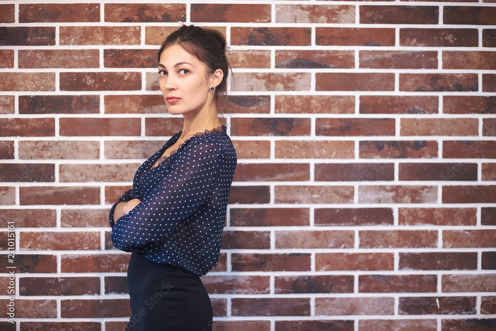 Business woman portrait with crossed arms