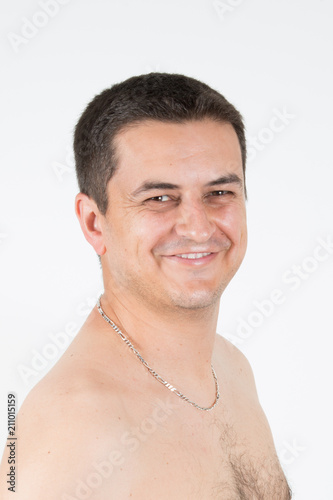 topless shirtless man smiling on white background