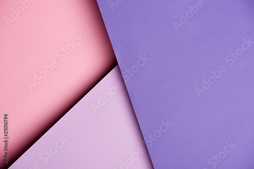Abstract background with purple and pink overlapping paper sheets