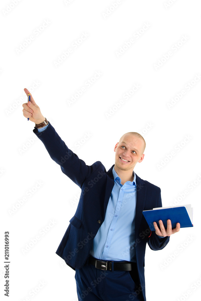 Happy young successful caucasian man suit holding a pen and notebook have new idea. Education or business theme. Happy young successful caucasian man suit holding a pen and notebook have new idea. Education or business theme.