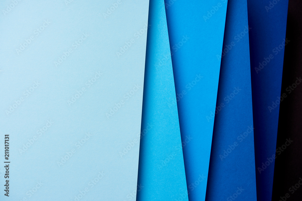 Abstract background with paper sheets in blue tones