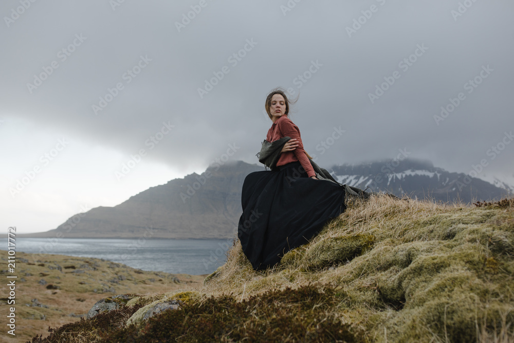 Woman wearing a dress in iceland