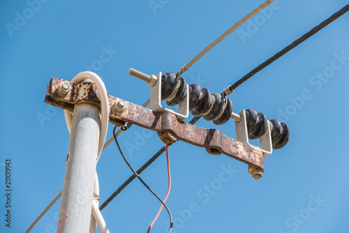 Closeup of a residential electricity line showing the dropwire from the main supply, Malta photo