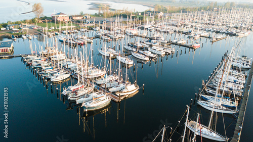 Aerial view of modern big luxury yachts in the sea port in franc