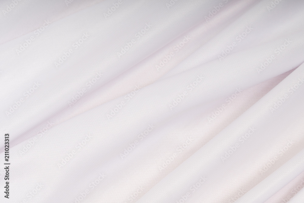 White cloth with pink hue in the folds White cloth with pink hue in the folds