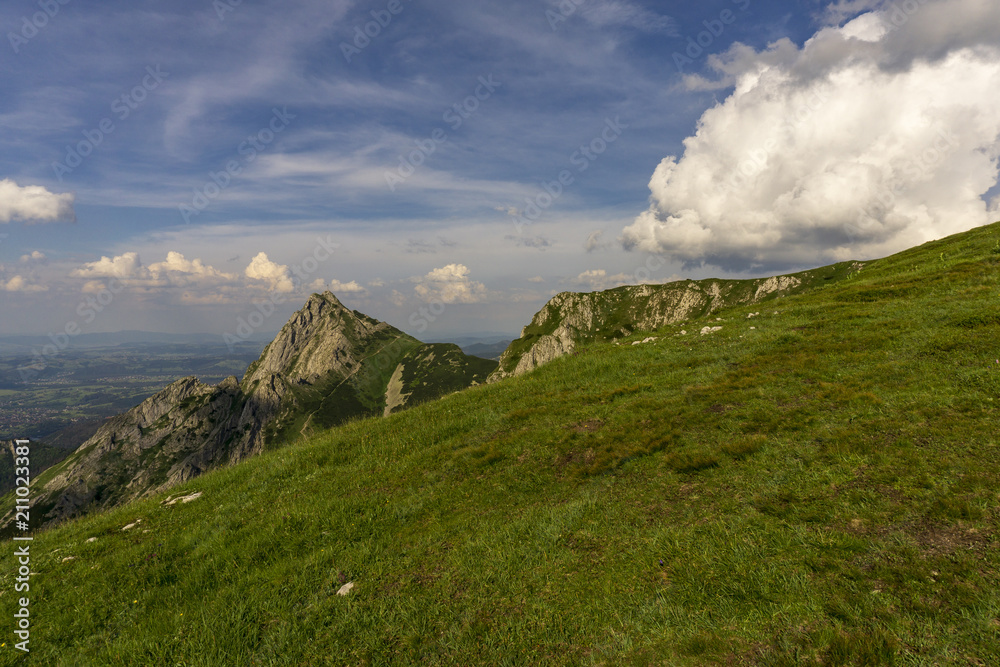 Giewont peak in a beautiful June scenery. Tatra Mountains. Poland. Giewont peak in a beautiful June scenery. Tatra Mountains. Poland.