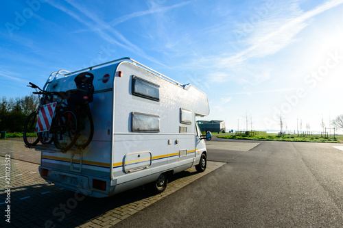 Camping car. Recreational vehicle motor home trailer on the road