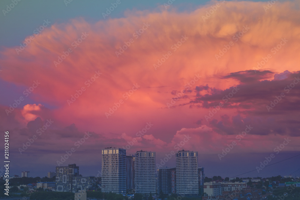 Beautiful sky at sunset over the city. Toning