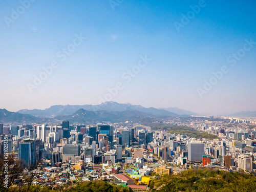 Panorama Seoul cityscape view from Namsan Hill.Blank space blue sky background.