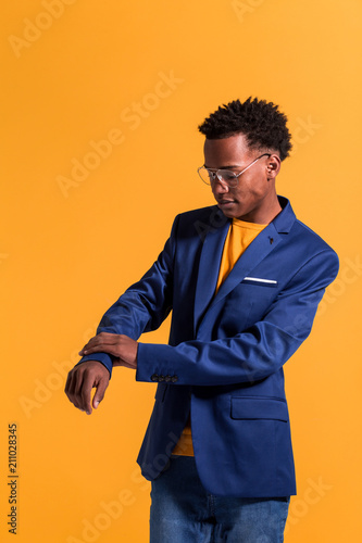 Dandy black man in jacket photo