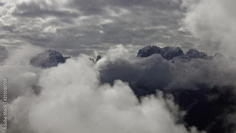Snow-capped mountains in clouds landscape in alps, Adamello Brenta, Italy, 4k Snow-capped mountains in clouds landscape in alps, Adamello Brenta, Italy, 4k