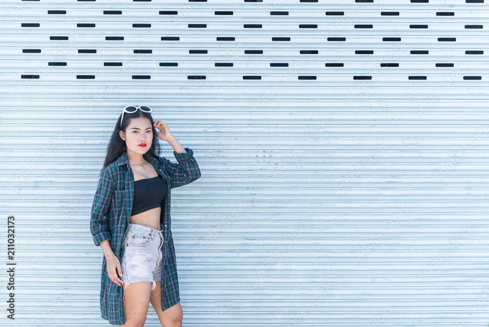 Obraz premium Portrait of beautiful asian woman,Hipsters girl for take a picture outdoor,Thailand people stand on stair