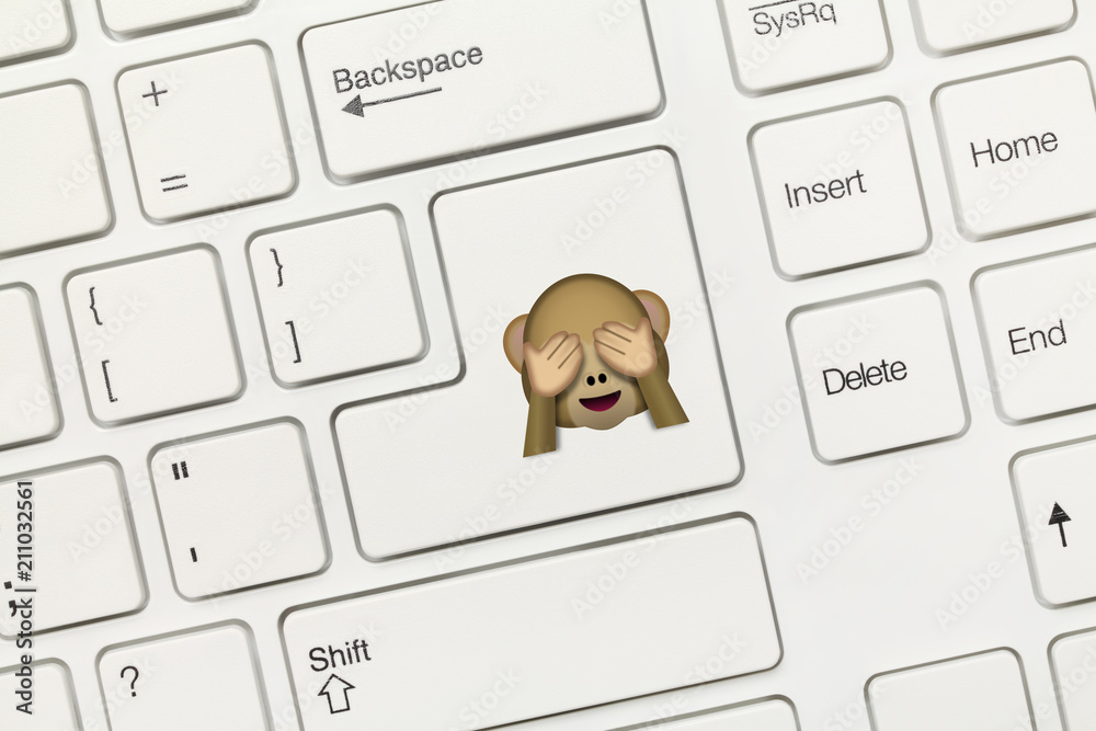 White conceptual keyboard Key with Monkey covering eyes Emoji symbol