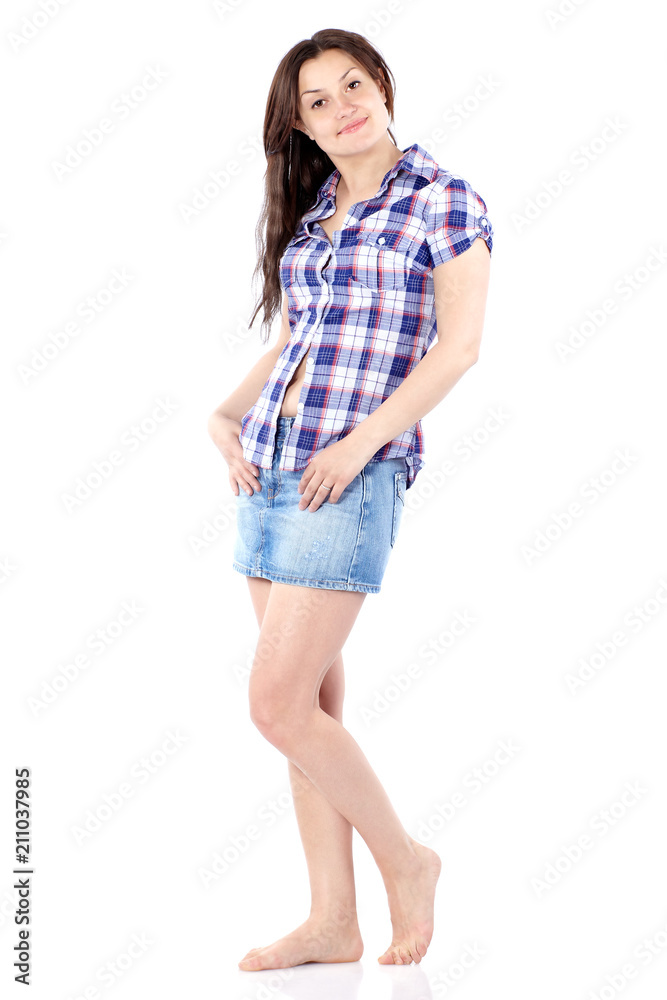 Skeptical young woman in a plaid shirt with long hair, full body isolated on white Skeptical young woman in a plaid shirt with long hair, full body isolated on white