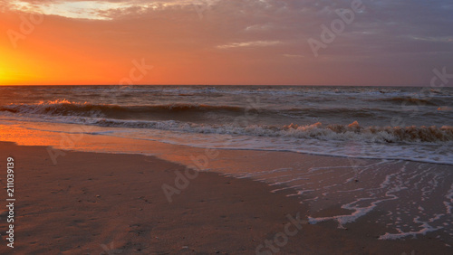 beach  sunset  dawn  sea  ocean  sky  water  dawn  sun  sand  clouds  landscape  cloud  wave  waves  nature  shore  evening  summer  horizon  beautiful  orange  blue  light