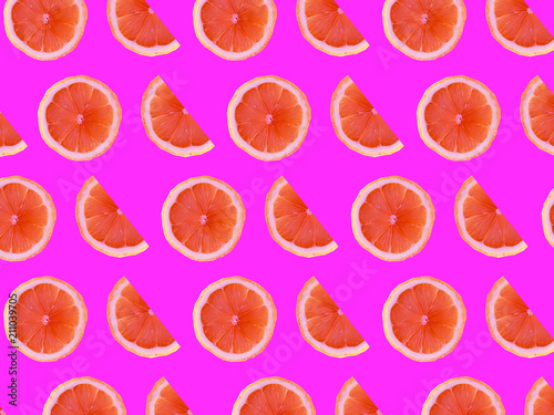 Abstract colorful background with slices of citrus  oranges