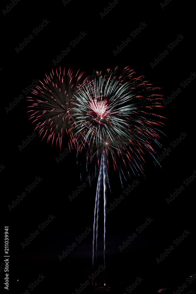 Fireworks display during night time fireworks show. Fireworks display during night time fireworks show.